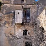 wall of a ruined stone house