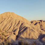 A yellow mound of dried clay.