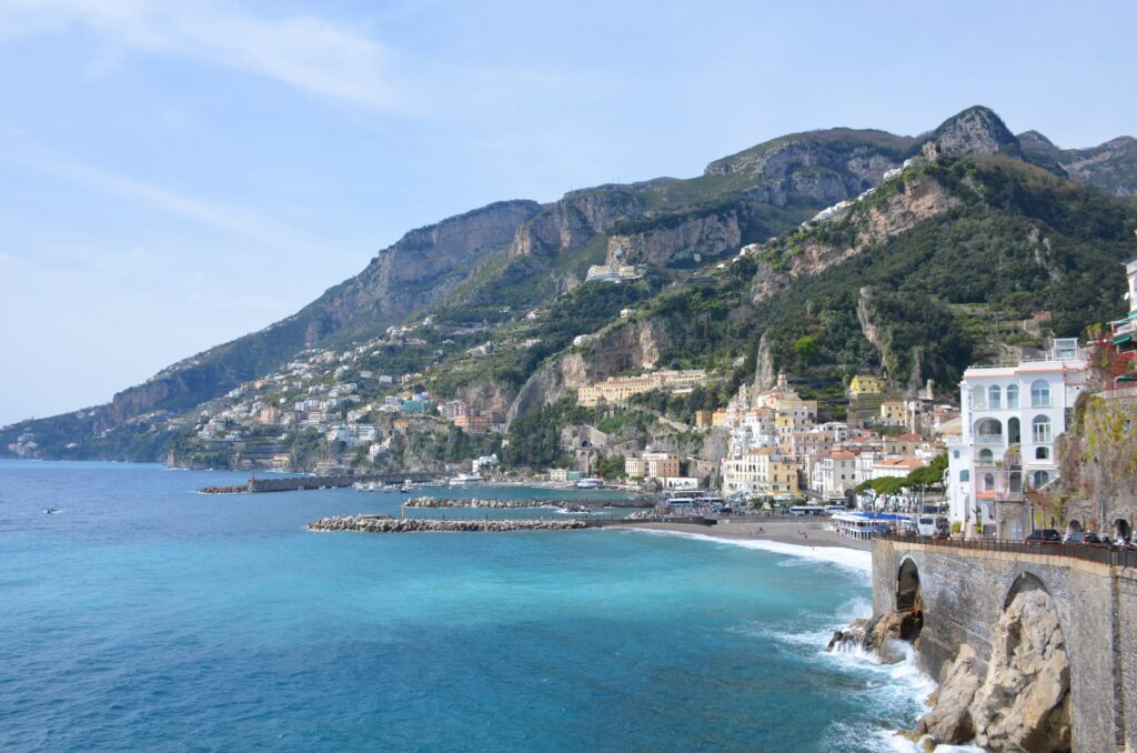 View from the Path of the Lemons of the green mountains on which the houses stand in Minori by the Costiera Amalfitana sea.